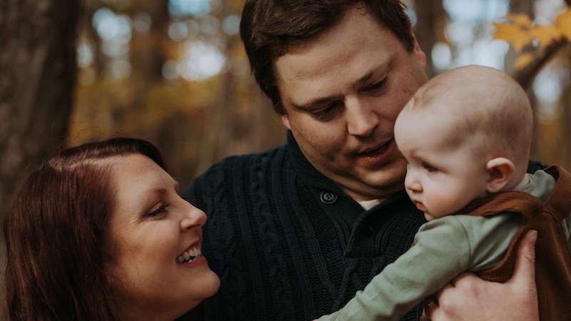 Sarah Haddaway and her husband, Noah, with their son Brooks. The Allegany County family, like many Maryland families, has struggled to find child care.