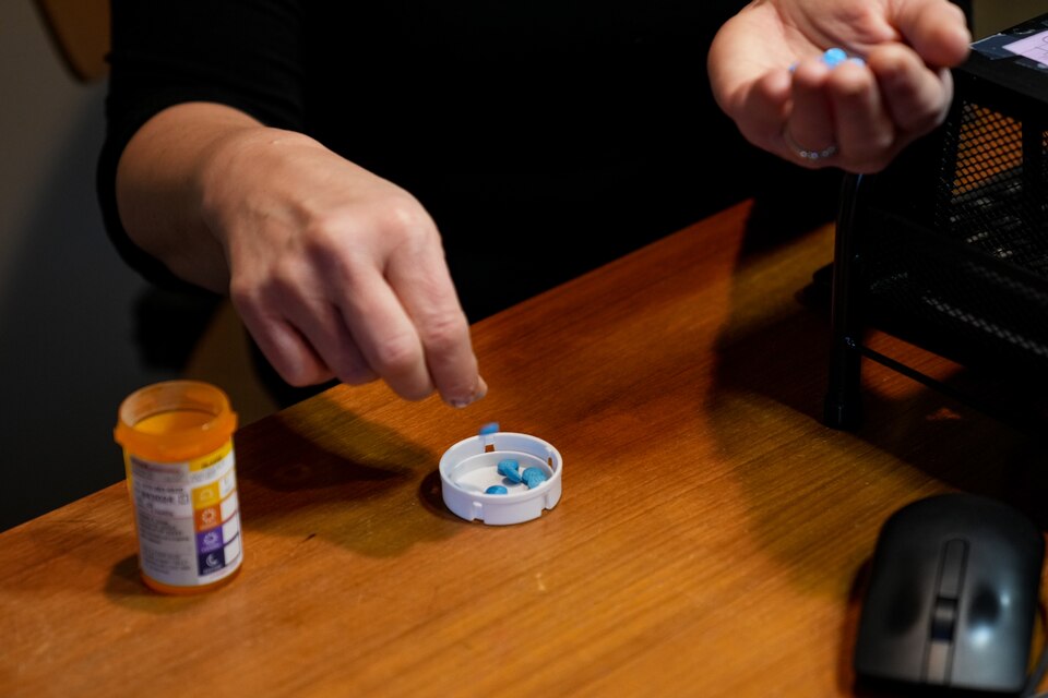 Blaire Postman, a Baltimore city resident who suffers from ADHD, demonstrates at her home how she has to ration her medication due to the possible unaffordablility or unavailablility of her meds in Baltimore City, Md. on February  12, 2023.