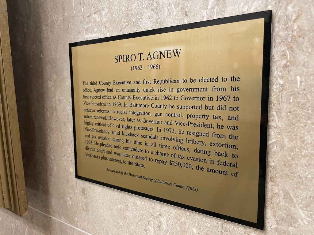 The portrait of Spiro Agnew that hangs in the Historic Courthouse in Towson is now accompanied by a plaque giving further information about the former county executive, governor and U.S. vice president's alleged corruption.