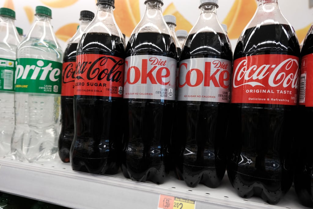 Bottles of Coca-Cola products including Diet Coke are displayed on a store shelf on July 14, 2023 in New York City.