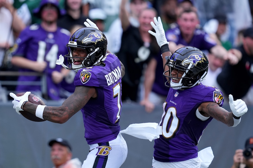 Rashod Bateman #7 of the Baltimore Ravens celebrates a touchdown alongside Demarcus Robinson #10 of the Baltimore Ravens in the third quarter of the game at MetLife Stadium on September 11, 2022 in East Rutherford, New Jersey.