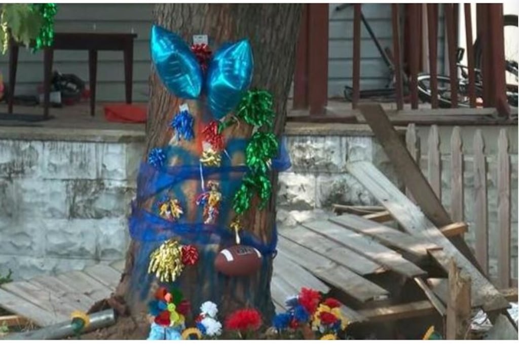 A memorial on a tree remembers Anthony Hilton III, an 18-year-old from Glen Burnie who died in a car crash in Brooklyn Park early on June 26, 2024.