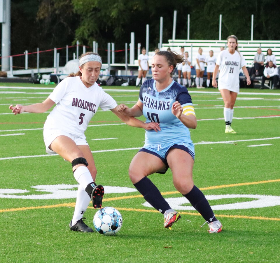 Broadneck's Aurora Nelson (left) and South River's Fiona Murray battle for the soccer ball during a regular season match earlier this month. The No. 1 Bruins and the Seahawks are set to compete in the Class 4A East Region playoffs.