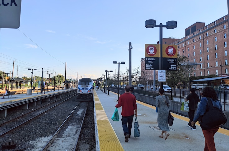 Commuters head to the 5:20 p.m. Camden Line MARC train on Tuesday, Sept. 13, 2022.
