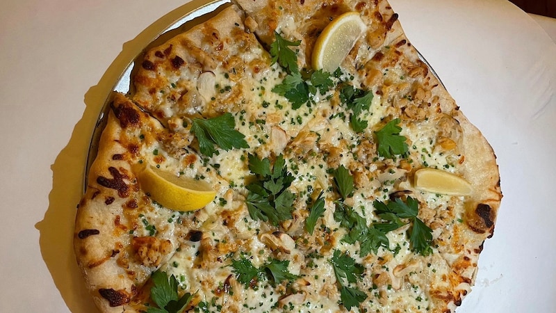 The Midwestern-style clam pizza — or tavern pie — is one of the occasional specials at Little Donna's in Baltimore.