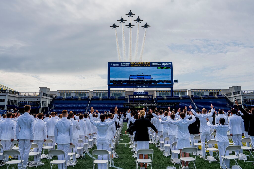 The Blue Angels fly over the graduates during commencement.