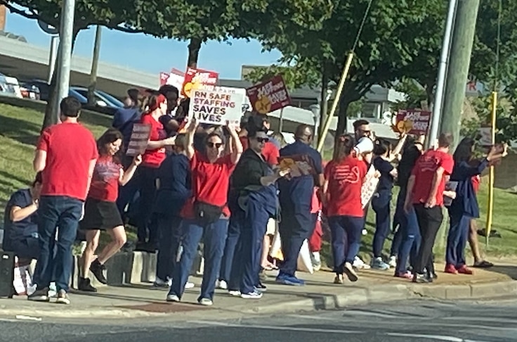 Members of a nurses union rally to address staffing issues outside Ascension St. Agnes Hospital in Catonsville on June 20, 2024.