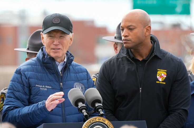 President Joe Biden, accompanied by Maryland Gov. Wes Moore, speaks near the site of the collapsed Key Bridge. Biden, on Friday, April 5, 2024, said " we will not rest ... until the cement has dried on the entirety of a new bridge, a new bridge."