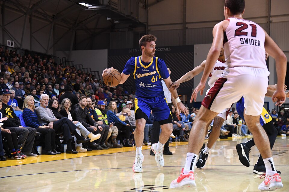 Pat Spencer handles the ball in a Dec. 29, 2023 game for the Santa Cruz Warriors. Last month, the 27-year-old made his NBA debut, nearly five years after winning the Tewaaraton Award for the best player in college lacrosse.